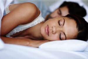 dreaming away cute young couple sleeping in bed t 2023 11 27 05 23 16 utc