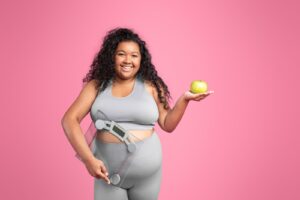 happy chubby african american lady in sportswear h 2023 11 27 05 03 12 utc